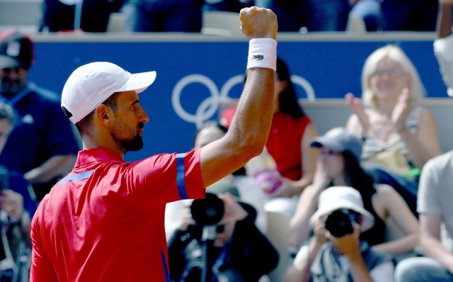 Novak Djokovic of Serbia reacts during the Men's Singles gold medal match against Carlos Alcaraz of Spain at the Tennis competitions in the Paris 2024 Olympic Games, at the Roland Garros in Paris, France, 04 August 2024.  ANSA/ETTORE FERRARI