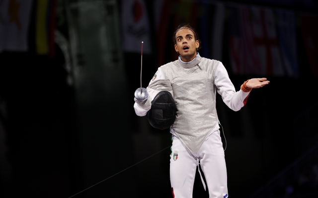 PARIS, FRANCE - AUGUST 04: Tommaso Marini of Team Italy reacts as he competes against Kyosuke Matsuyama of Team Japan (not pictured) during the Fencing Men's Foil Team Gold Medal match on day nine of the Olympic Games Paris 2024 at Grand Palais on August 04, 2024 in Paris, France. (Photo by Maja Hitij/Getty Images)