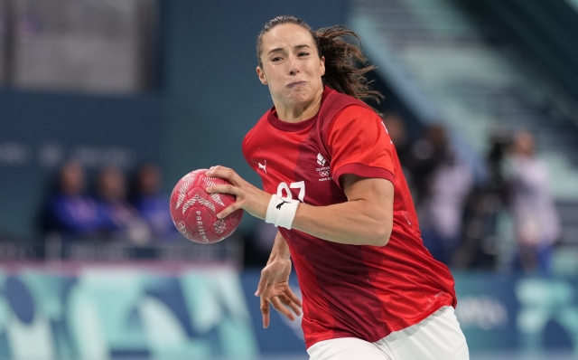 Denmark's Louise Vinter Burgaard is in action during a quarterfinal handball match between Denmark and the Netherlands at the 2024 Summer Olympics, Tuesday, Aug. 6, 2024, in Villeneuve-d'Ascq, France. (AP Photo/Aaron Favila)