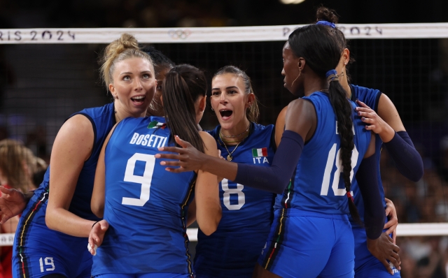 PARIS, FRANCE - AUGUST 06: Alessia Orro #8 of Team Italy reacts with teammates during a Women's Quarterfinals match against Team Serbia on day eleven of the Olympic Games Paris 2024 at Paris Arena on August 06, 2024 in Paris, France. (Photo by Clive Brunskill/Getty Images)