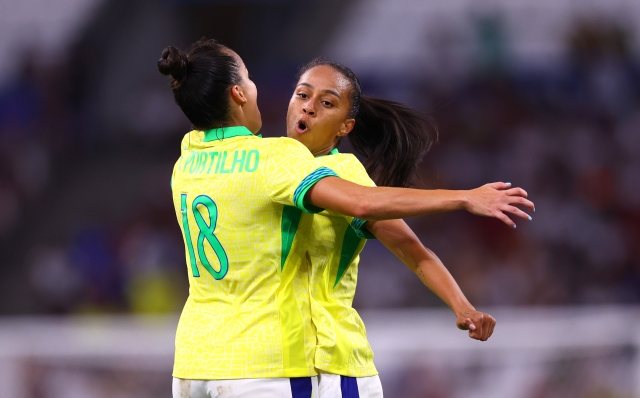 MARSEILLE, FRANCE - AUGUST 06: Adriana #9 of Team Brazil celebrates scoring her team's third goal with teammate Gabi Portilho during the Women's semifinal match between Brazil and Spain during the Olympic Games Paris 2024 at Stade de Marseille on August 06, 2024 in Marseille, France. (Photo by Phil Walter/Getty Images)