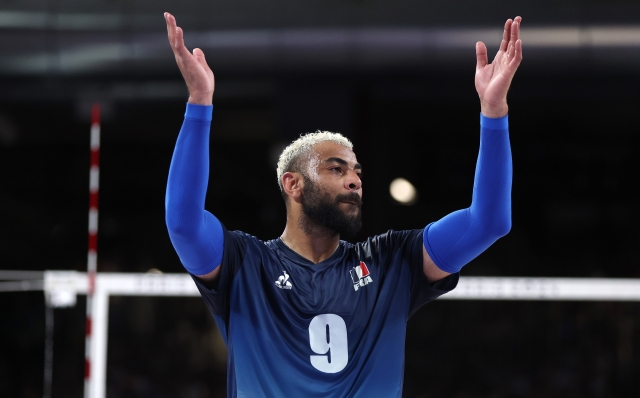 PARIS, FRANCE - AUGUST 07: Earvin Ngapeth #9 of Team France reacts during a Men's Semifinals match against Team Italy on day twelve of the Olympic Games Paris 2024 at Paris Arena on August 07, 2024 in Paris, France. (Photo by Matthew Stockman/Getty Images)