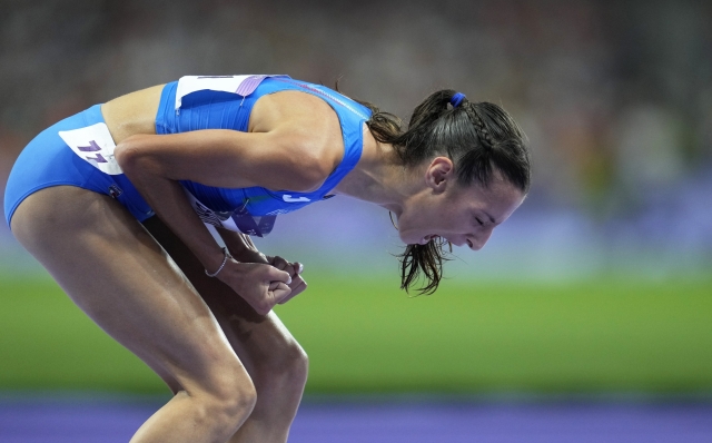 Nadia Battocletti, of Italy, reacts after winning the silver medal in the women's 10000 meters final at the 2024 Summer Olympics, Friday, Aug. 9, 2024, in Saint-Denis, France. (AP Photo/Ashley Landis)