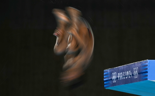 Mexico's Kevin Berlin Reyes competes in the men's 10m platform diving semi-final during the Paris 2024 Olympic Games at the Aquatics Centre in Saint-Denis, north of Paris, on August 10, 2024. (Photo by Oli SCARFF / AFP)