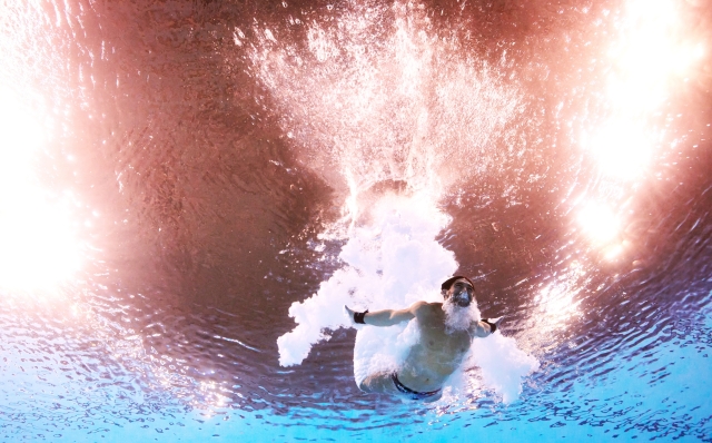 PARIS, FRANCE - AUGUST 10: (EDITORS NOTE: Image was captured using an underwater robotic camera.) Brandon Loschiavo of Team United States competes in the Men's 10m Platform Semifinal on day fifteen of the Olympic Games Paris 2024 at Aquatics Centre on August 10, 2024 in Paris, France. (Photo by Maddie Meyer/Getty Images)