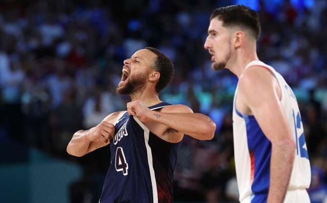 PARIS, FRANCE - AUGUST 10: Stephen Curry #4 of Team United States reacts in front of Nando de Colo #12 of Team France during the Men's Gold Medal game between Team France and Team United States on day fifteen of the Olympic Games Paris 2024 at Bercy Arena on August 10, 2024 in Paris, France. (Photo by Ezra Shaw/Getty Images)