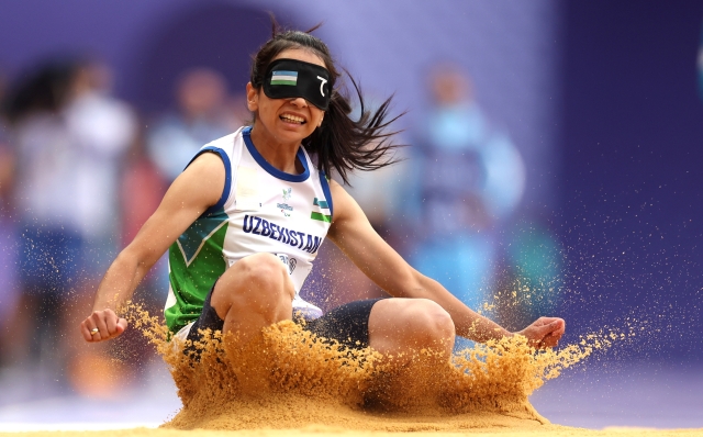 PARIS, FRANCE - AUGUST 30: Asila Mirzayorova of Team Uzbekistan competes in the Women's Long Jump - T11 Final on day two of the Paris 2024 Summer Paralympic Games at Stade de France on August 30, 2024 in Paris, France. (Photo by Ezra Shaw/Getty Images)