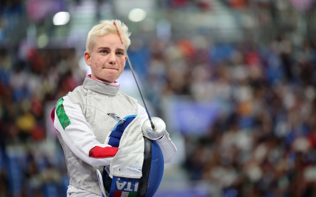 PARIS, FRANCE - SEPTEMBER 04: Beatrice Maria Vio Grandis of Team Italy competes against Nadiia Doloh of Team Ukraine during the Women's Foil Category B Quarterfinal on day seven of the Paris 2024 Summer Paralympic Games at Grand Palais on September 04, 2024 in Paris, France. (Photo by Alex Slitz/Getty Images)