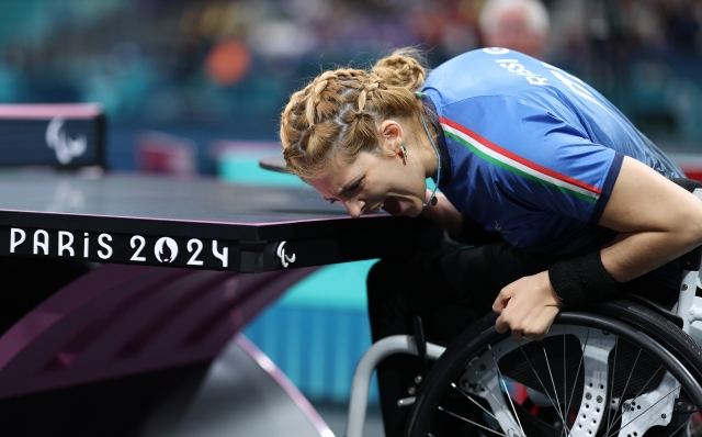 PARIS, FRANCE - SEPTEMBER 05: Giada Rossi of Team Italy celebrates a point against Dorota Buclaw of Team Poland (not pictured) in the Women's Singles WS1-2 Semi Final 2 Game 10 match on day eight of the Paris 2024 Summer Paralympic Games at South Paris Arena on September 05, 2024 in Paris, France. (Photo by Elsa/Getty Images)