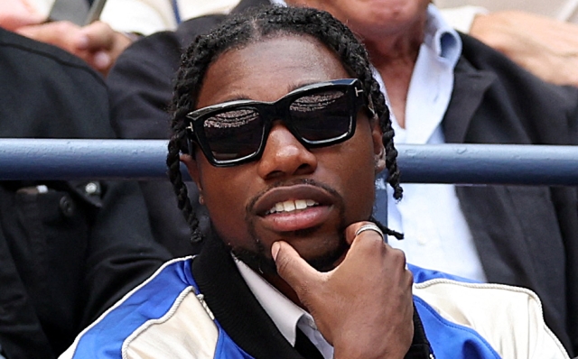 NEW YORK, NEW YORK - SEPTEMBER 08: Noah Lyles attends the Men's Singles Final match between Taylor Fritz of the United States and Jannik Sinner of Italy on Day Fourteen of the 2024 US Open at USTA Billie Jean King National Tennis Center on September 08, 2024 in the Flushing neighborhood of the Queens borough of New York City.   Matthew Stockman/Getty Images/AFP (Photo by MATTHEW STOCKMAN / GETTY IMAGES NORTH AMERICA / Getty Images via AFP)