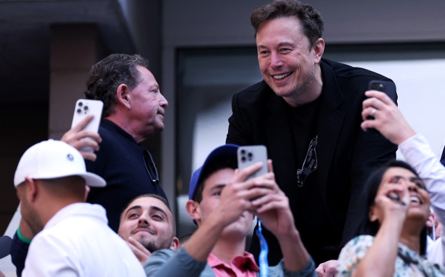 NEW YORK, NEW YORK - SEPTEMBER 08: Elon Musk attends the Men's Singles Final match between Taylor Fritz of the United States and Jannik Sinner of Italy on Day Fourteen of the 2024 US Open at USTA Billie Jean King National Tennis Center on September 08, 2024 in the Flushing neighborhood of the Queens borough of New York City.   Sarah Stier/Getty Images/AFP (Photo by Sarah Stier / GETTY IMAGES NORTH AMERICA / Getty Images via AFP)