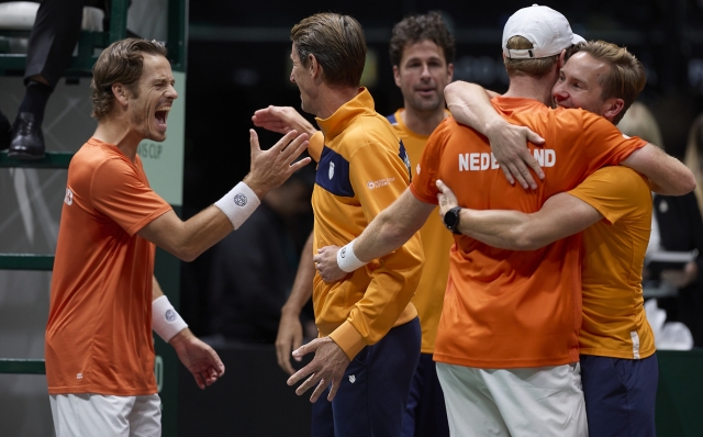 BOLOGNA, ITALY - SEPTEMBER 15: Players of Netherlands celebrate their qualification at Davis Cup Finals Eight in Malaga during the 2024 Davis Cup Finals Group Stage Bologna match between Italy and Netherlands at Unipol Arena on September 15, 2024 in Bologna, Italy. (Photo by Emmanuele Ciancaglini/Getty Images for ITF)