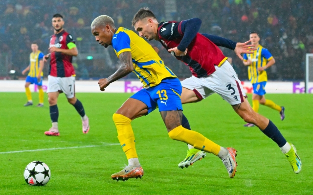 Bologna's Austrian defender #03 Stefan Posch (R) fights for the ball with Shakhtar Donetsk's Brazilian defender #13 Pedrinho during the UEFA Champions League 1st round day 1 football match between Bologna FC and Shakthar Donetsk, at the Stadio Renato Dall'Ara in Bologna on September 18, 2024. (Photo by Andreas SOLARO / AFP)