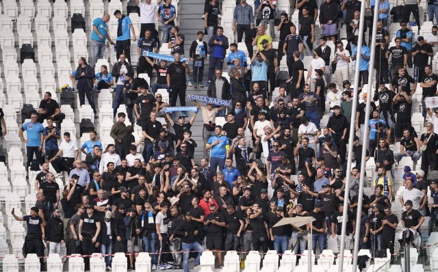 Napoli fans during the Serie A soccer match between Juventus Fc and SSC Napoli at the Juventus Stadium in Turin, north west Italy - September 21, 2024. Sport - Soccer (Photo by Fabio Ferrari/LaPresse)