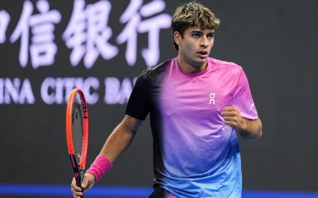 BEIJING, CHINA - SEPTEMBER 26: Flavio Cobolli of Italy reacts in the Men's Singles First Round against Alexander Bublik of Kazakhstan during day four of the 2024 China Open at National Tennis Center on September 26, 2024 in Beijing, China. (Photo by Shi Tang/Getty Images)