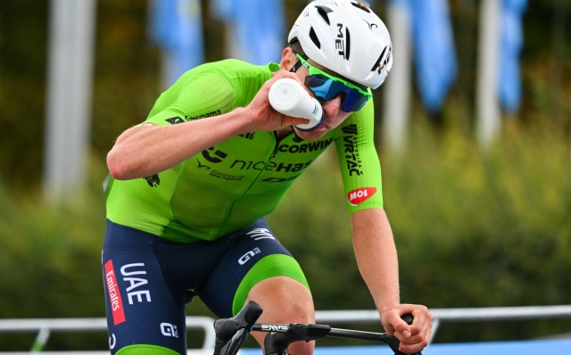 Slovenia's Tadej Pogacar drinks as he competes in the men's Elite Road Race cycling event during the UCI 2024 Road World Championships, in Zurich, on September 29, 2024. (Photo by Fabrice COFFRINI / AFP)