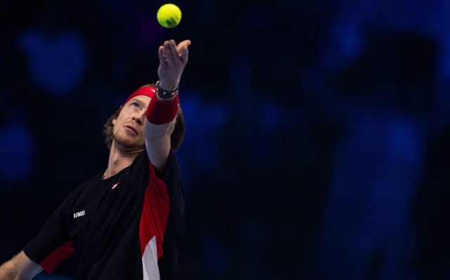 Russia's Andrey Rublev serves to  Norway's Casper Ruud during the singles tennis match of the ATP World Tour Finals at the Inalpi Arena in Turin, Italy - Sport - Friday, November 15, 2024. (Photo by Marco Alpozzi/Lapresse)