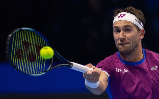 Norway's Casper Ruud serves to Russia's Andrey Rublev during the singles tennis match of the ATP World Tour Finals at the Inalpi Arena in Turin, Italy - Sport - Friday, November 15, 2024. (Photo by Marco Alpozzi/Lapresse)