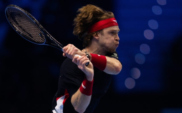 Russia's Andrey Rublev  returns the ball to Norway's Casper Ruud during their singles tennis match of the ATP World Tour Finals at the Inalpi Arena, in Turin, Italy - Sport - Friday, November 15, 2024. (Photo by Marco Alpozzi/Lapresse)