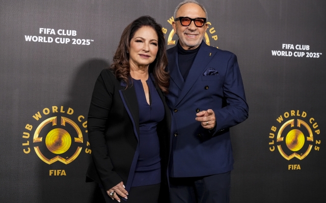 Gloria and Emilio Estefan arrive ahead of the draw for the 2025 FIFA Club World Cup soccer tournament, Thursday, Dec. 5, 2024, in Miami. (AP Photo/Rebecca Blackwell)