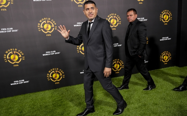 Juan Roman Riquelme arrives ahead of the draw for the 2025 FIFA Club World Cup soccer tournament, Thursday, Dec. 5, 2024, in Miami. (AP Photo/Rebecca Blackwell)