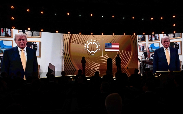 US President-elect Donald Trump speaks virtually to attendees during the 2025 FIFA Club World Cup Draw ceremony in Miami on December 5, 2024. (Photo by Giorgio VIERA / AFP)