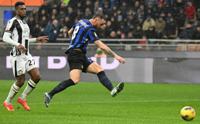 Inter Milans forward Marko Arnautovi? (R) scores the 1-0 during the Coppa Italia soccer match between Inter Milan and Udinese at the Giuseppe Meazza Stdium in Milan, Italy, 19 December 2024. ANSA/DANIEL DAL ZENNARO