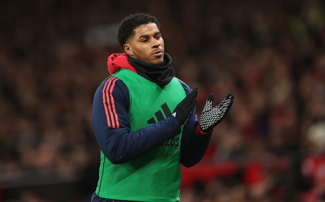 MANCHESTER, ENGLAND - DECEMBER 30: Marcus Rashford of Manchester United applauds the fans while warming up during the Premier League match between Manchester United FC and Newcastle United FC at Old Trafford on December 30, 2024 in Manchester, England. (Photo by Carl Recine/Getty Images)