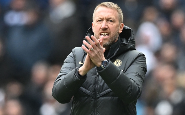 (FILES) Chelsea's then English head coach Graham Potter gestures on the touchline during the English Premier League football match between Tottenham Hotspur and Chelsea at Tottenham Hotspur Stadium in London on February 26, 2023. Potter was named West Ham's new manager on January 9, 2025 on a two-and-a-half-year contract, the club said, a day after sacking Julen Lopetegui. (Photo by JUSTIN TALLIS / AFP) / RESTRICTED TO EDITORIAL USE. No use with unauthorized audio, video, data, fixture lists, club/league logos or 'live' services. Online in-match use limited to 120 images. An additional 40 images may be used in extra time. No video emulation. Social media in-match use limited to 120 images. An additional 40 images may be used in extra time. No use in betting publications, games or single club/league/player publications. /