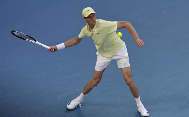 epa11832982 Jannik Sinner of Italy in action during his Men's Singles round 3 match against Marcos Giron of the USA at the Australian Open tennis tournament in Melbourne, Australia, 18 January 2025.  EPA/ROLEX DELA PENA