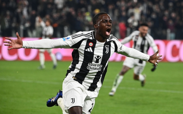 Juventus' American forward #22 Tim Weah celebrates his team's second goal during the Italian Serie A football match between Juventus and AC Milan at the Allianz stadium in Turin, on January 18, 2025. (Photo by Isabella BONOTTO / AFP)