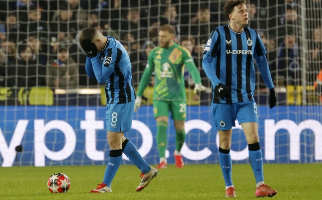 Brugge's Christos Tzolis, left, reacts after a missed opportunity on goal during the Champions League opening phase soccer match between Club Brugge and Juventus at the Jan Breydel Stadium in Bruges, Belgium, Tuesday, Jan. 21, 2025. (AP Photo/Geert Vanden Wijngaert)