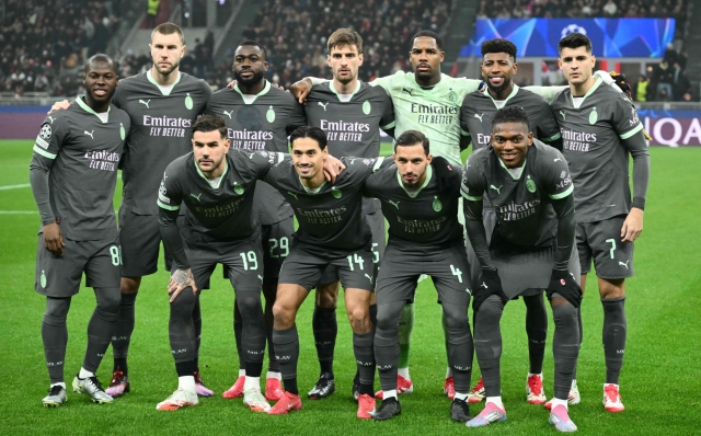 AC Milan's Team players (from L, 2ndrow) AC Milan's American midfielder #80 Yunus Musah, AC Milan's Serbian defender #31 Strahinja Pavlovic, AC Milan's French midfielder #29 Youssouf Fofana, AC Milan's Italian defender #46 Matteo Gabbia, AC Milan's French goalkeeper #16 Mike Maignan, AC Milan's Brazilian defender #22 Emerson Royal, AC Milan's Spanish forward #07 Alvaro Morata, AC Milan's French defender #19 Theo Hernandez, AC Milan's Dutch midfielder #14 Tijani Reijnders, AC Milan's Algerian midfielder #04 Ismael Bennacer and AC Milan's Portuguese forward #10 Rafael Leao pose before the UEFA Champions League football match between AC Milan and Girona at San Siro stadium in Milan, on January 22, 2025. (Photo by Alberto PIZZOLI / AFP)