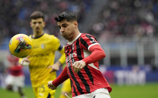 AC Milan\'s Alvaro Morata makes an attempt to score during a Serie A soccer match between AC Milan and Parma, at the San Siro stadium in Milan, Italy, Sunday, Jan. 26, 2025. (AP Photo/Luca Bruno)