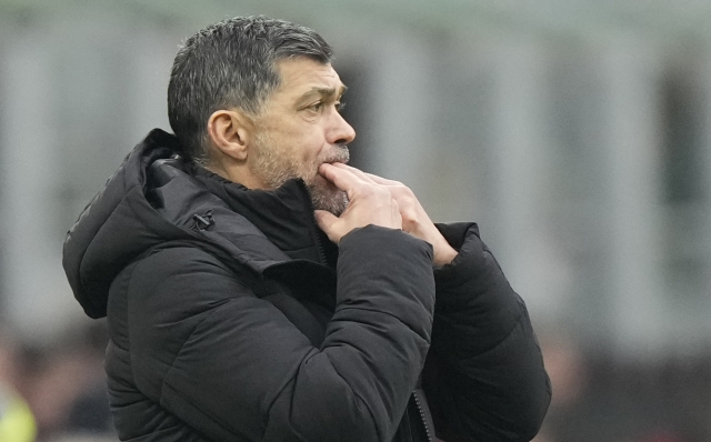 AC Milan's head coach Sergio Conceicao whistles during a Serie A soccer match between AC Milan and Parma, at the San Siro stadium in Milan, Italy, Sunday, Jan. 26, 2025. (AP Photo/Luca Bruno)