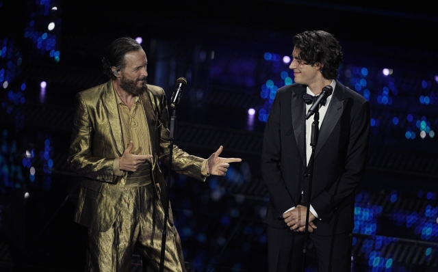 Jovanotti and Gianmarco Tamberi during the first evening of 75th edition of the Sanremo Italian Song Festival at the Ariston Theatre in Sanremo, northern Italy - Tuesday, February 11, 2025. Entertainment. (Photo by Marco Alpozzi/LaPresse)