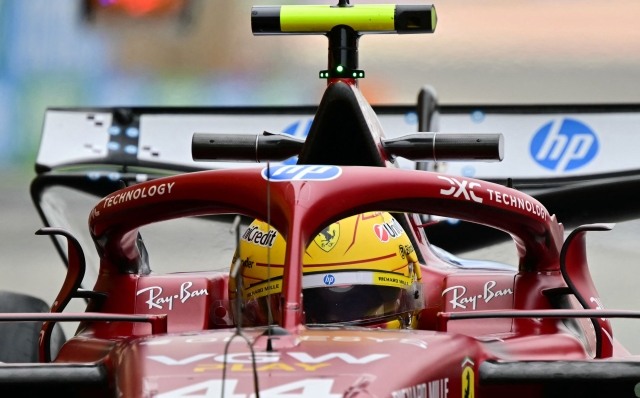 Ferrari's British driver Lewis Hamilton pits during the second day of the Formula One pre-season testing at the Bahrain International Circuit in Sakhir on February 27, 2025. (Photo by Giuseppe CACACE / AFP)