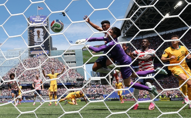 SEATTLE, WASHINGTON - JUNE 19: (EDITOR'S NOTE: Image was captured using a remote camera from behind the goal.) Alex Freeman #16 of the United States heads to score the team's second goal during the FIFA World Cup 2026 Group D match between USA and Australia at Seattle Stadium on June 19, 2026 in Seattle, Washington. Emilee Chinn/Getty Images/AFP (Photo by Emilee Chinn / GETTY IMAGES NORTH AMERICA / Getty Images via AFP)