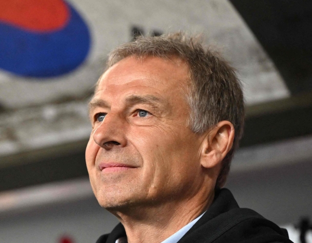 (FILES) South Koreas head coach Jurgen Klinsmann looks on before an international friendly football match between South Korea and Colombia in Ulsan on March 24, 2023. South Korea sacked Jurgen Klinsmann as national football team coach, the Korean Football Association said on February 16, 2024. (Photo by Jung Yeon-je / AFP)