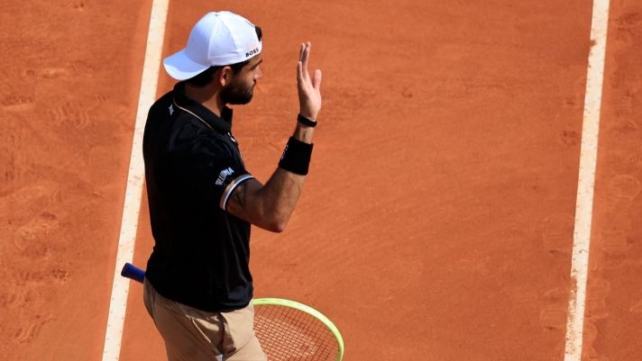 Italy's Matteo Berrettini celebrates winning against US' Maxime Cressy at the end of their Monte-Carlo ATP Masters Series tournament round of 64 tennis match in Monaco on April 10, 2023. (Photo by Valery HACHE / AFP)