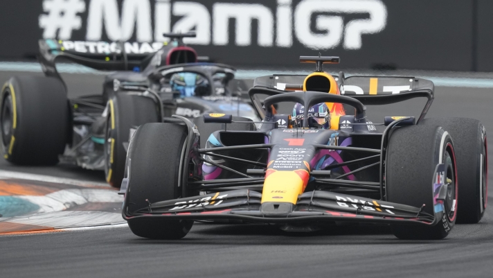 Red Bull driver Max Verstappen battles Mercedes driver George Russell (63) during the Formula One Miami Grand Prix auto race at the Miami International Autodrome, Sunday, May 7, 2023, in Miami Gardens, Fla. (AP Photo/Rebecca Blackwell)