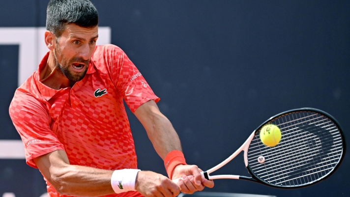 Novak Djokovic of Serbia in action during his men's singles third round match against Grigor Dimitrov of Bulgaria (not pictured) at the Italian Open tennis tournament in Rome, Italy, 14 May 2023.  ANSA/ETTORE FERRARI
