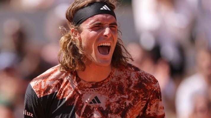 Greece's Stefanos Tsitsipas celebrates after winning against Czech Republic's Jiri Vesely at the end of their men's singles match on day one of the Roland-Garros Open tennis tournament at the Court Philippe-Chatrier in Paris on May 28, 2023. (Photo by Thomas SAMSON / AFP)