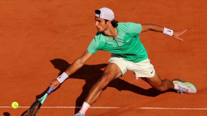 PARIS, FRANCE - MAY 28: Lorenzo Musetti of Italy plays a backhand against Mikael Ymer of Sweden during their Men's Singles First Round match on Day One of the 2023 French Open at Roland Garros on May 28, 2023 in Paris, France. (Photo by Clive Brunskill/Getty Images)