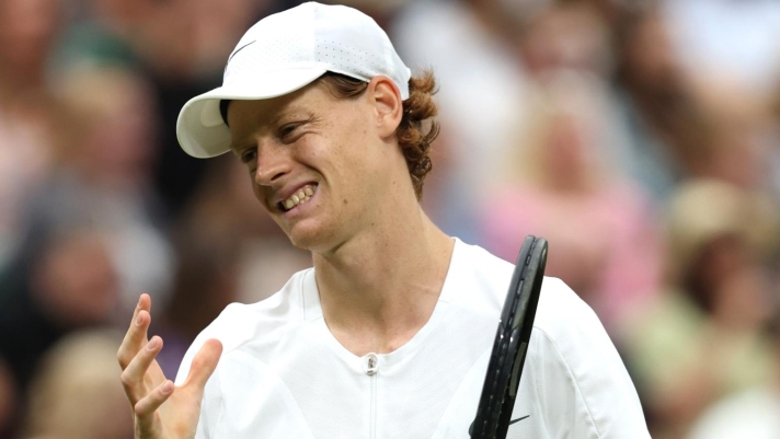 LONDON, ENGLAND - JULY 14: Jannik Sinner of Italy reacts during the Men's Singles Semi Final against Novak Djokovic of Serbia on day twelve of The Championships Wimbledon 2023 at All England Lawn Tennis and Croquet Club on July 14, 2023 in London, England. (Photo by Clive Brunskill/Getty Images)