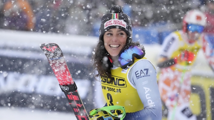 Federica Brignone of Italy reacts to her winning time as she arrives at the end of the course for the women's World Cup giant slalom in Mont Tremblant, Quebec,, Sunday, Dec. 3, 2023. (Frank Gunn /The Canadian Press via AP)