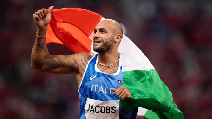 TOKYO, JAPAN - AUGUST 01: Lamont Marcell Jacobs of Team Italy celebrates after winning the Men's 100m Final on day nine of the Tokyo 2020 Olympic Games at Olympic Stadium on August 01, 2021 in Tokyo, Japan.  (Photo by David Ramos/Getty Images)
