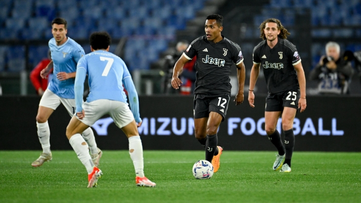 ROME, ITALY - APRIL 23: Alex Sandro of Juventus dribbles the ball during the Coppa Italia Semi-final Second Leg match between SS Lazio and Juventus FC at Stadio Olimpico on April 23, 2024 in Rome, Italy. (Photo by Daniele Badolato - Juventus FC/Juventus FC via Getty Images)