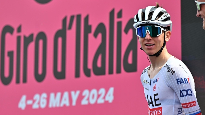 Slovenian rider Tadej Pogacar of Uae Team Emirates on the signing in podium ahead the departure of the 2th stage of the 107 Giro d'Italia 2024, cycling race over 161 km from San Francesco al Campo to Santuario di Oropa, Italy, 05 May 2024. ANSA/LUCA ZENNARO