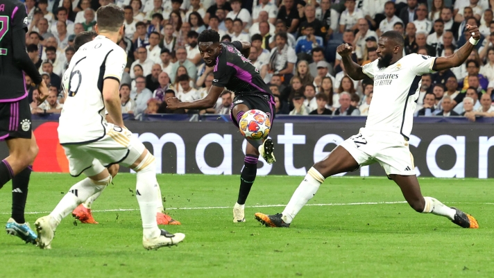 MADRID, SPAIN - MAY 08: Alphonso Davies of Bayern Munich scores his team's first goal during the UEFA Champions League semi-final second leg match between Real Madrid and FC Bayern München at Estadio Santiago Bernabeu on May 08, 2024 in Madrid, Spain. (Photo by Alexander Hassenstein/Getty Images)